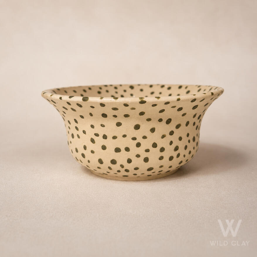 Moss Spot Bowl $30 | 12 cm | Out of stock A handmade bowl with a natural clay body and scattered moss-green speckles.
