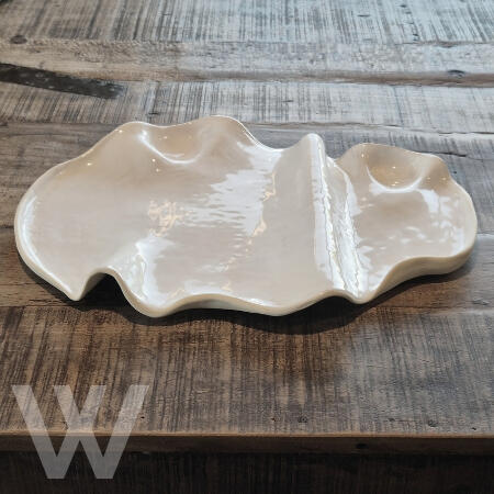 Wave Chacuterie board 38cm x 27cm (SOLD) $130.00 Handmade ceramic wave platter in a clean white glaze. a Modern sculptural feel , perfect for entertaining.