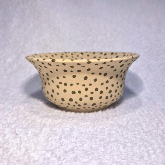 Moss Spot Bowl $30.00 (1 in stock) 5.5cm H by 12cm W A handmade ceramic bowl with the natural clay body, finished with scattered moss‑green speckles. Ideal for snacks, dips.