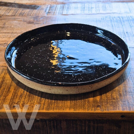 Entertaining Platter - Tuxedo Black Lge $125.00 (Sold) 3.5cm H by 34cm W Sml $65.00 (Sold) (3cm H by 26cm W) Hand built ceramic platter, designed for salads or warm dishes when hosting. Preorders Available