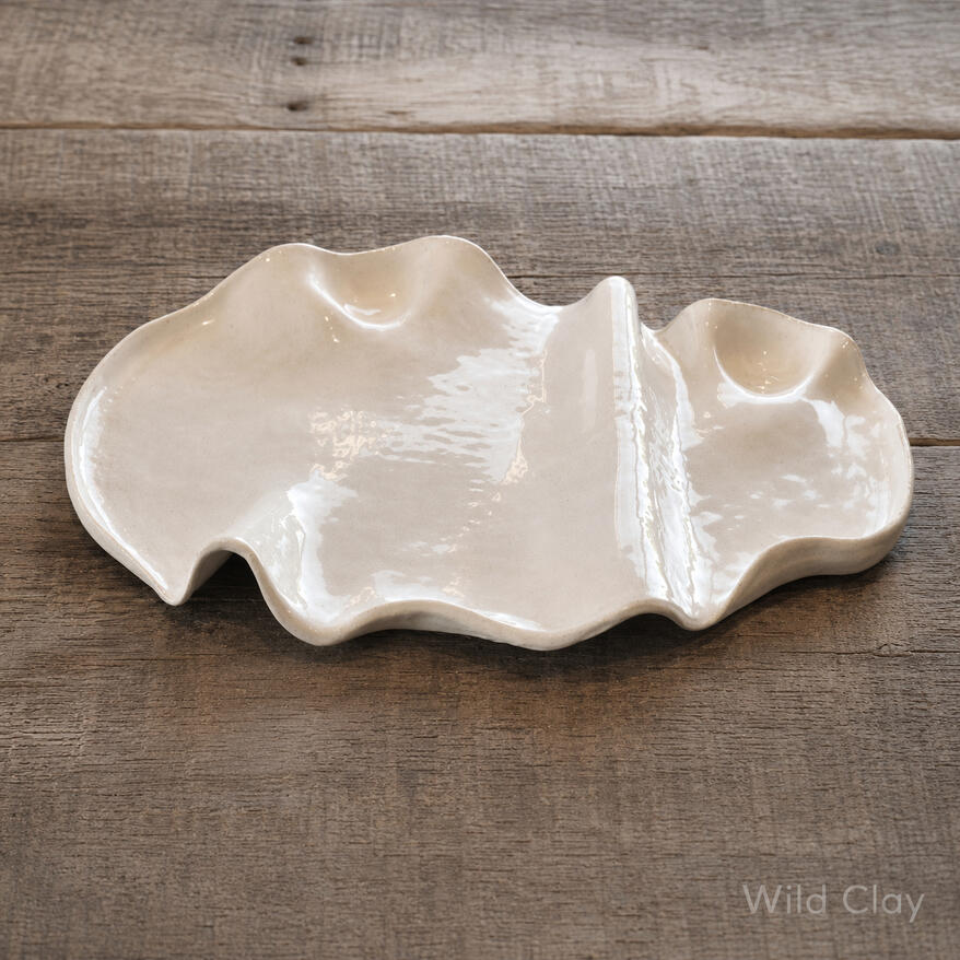 Charcuterie Board approx. 40 cm | from $140.00Preorder A wave platter in a clean white glaze, with a modern sculptural feel.