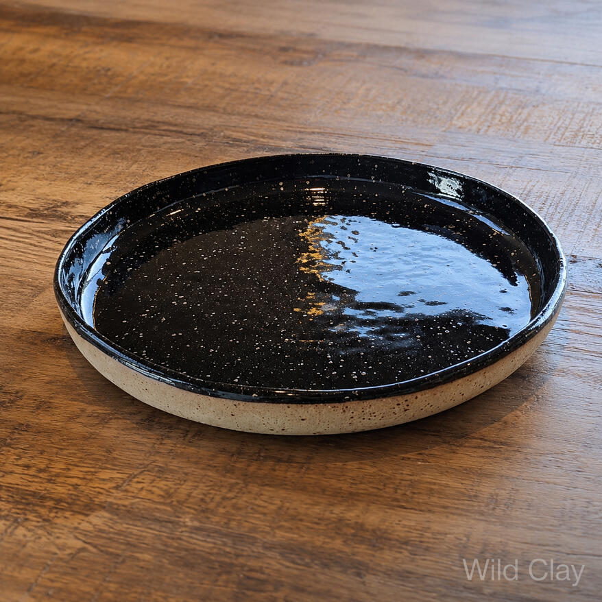 Platter - Tuxedo Black Large $127.67 | 34 cm | Preorder Small $65.99 | 26 cm | Preorder A hand-built platter for salads or warm dishes when hosting.