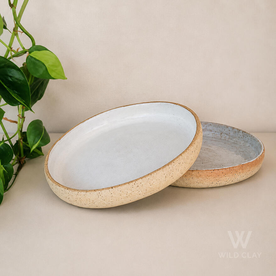 Serving Platter - White Speckle Large $127.67 | 34 cm | Preorder Small $65.99 | 26 cm | 1 in stock A stoneware platter in a soft white speckle, clean and easy to style.